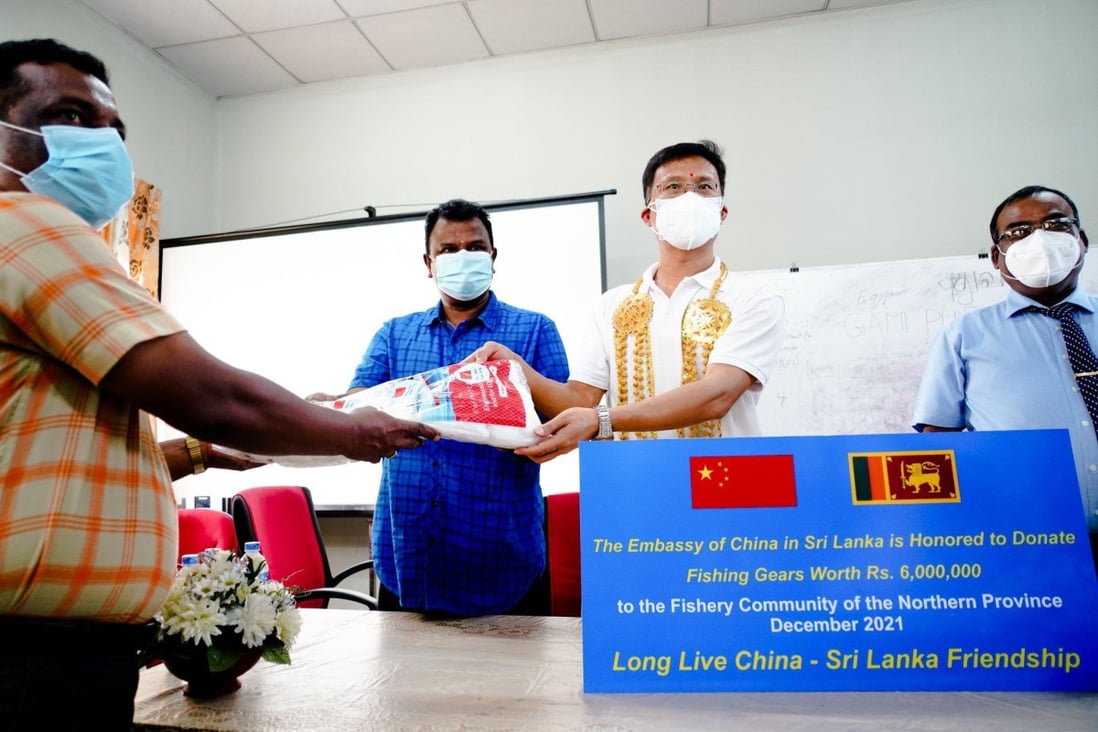 A photo shared on Twitter by the Chinese Embassy in Sri Lanka shows Ambassador Qi Zhenhong presenting donations during his visit to Jaffna and Mannar.