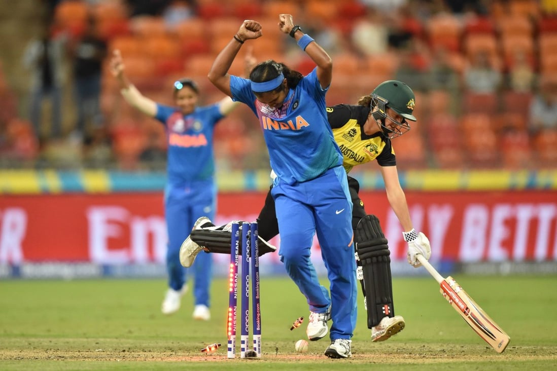 India’s Shikha Pandey (centre) stumps Australia’s Molly Strano (right) to win the opening match of the women’s Twenty20 World Cup at the Sydney Showground in on February 21, 2020. Photo: AFP