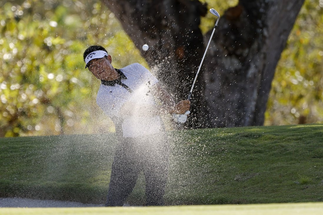 Carl Yuan chips out of the bunker on 12 at The Panama Championship. Photo: Getty Images
