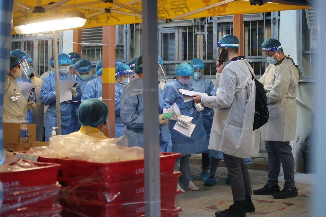Hing Ping House at the Tai Hing Estate in Tuen Mun under lockdown, where residents were required to undergo mandatory testing for coronavirus on 4 February 2022. Photo: Edmond So
