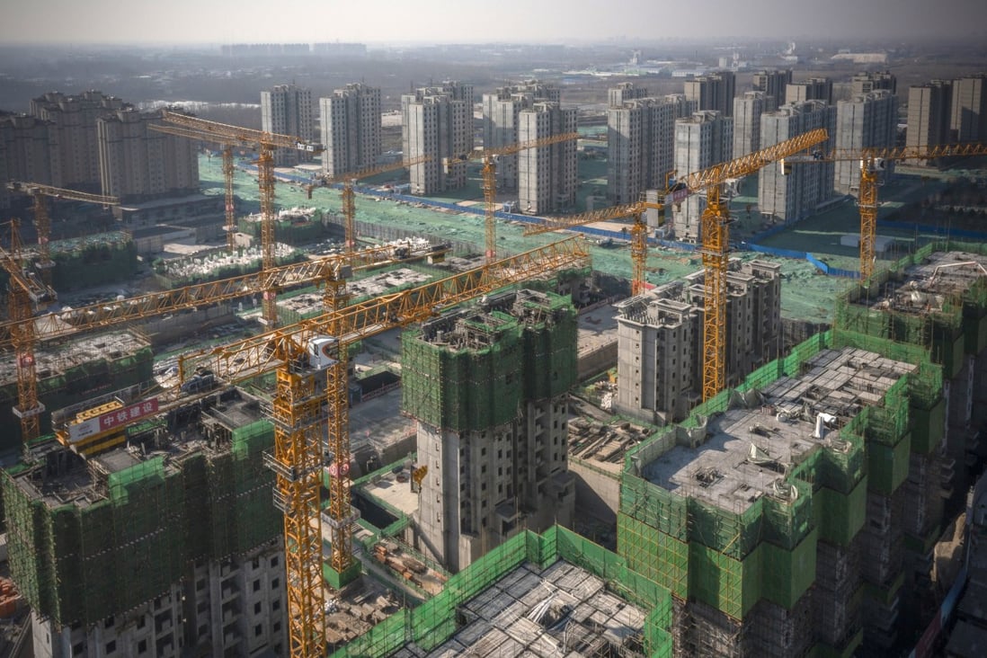 Unfinished apartment buildings at a China Evergrande construction site in Beijing. Photo: Bloomberg