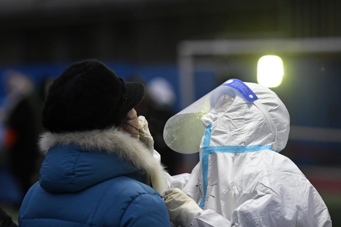 A resident of Tianjin in northern China is tested for Covid-19 on January 20, during a fourth round of city-wide tests following an outbreak on January 8. Photo: Xinhua