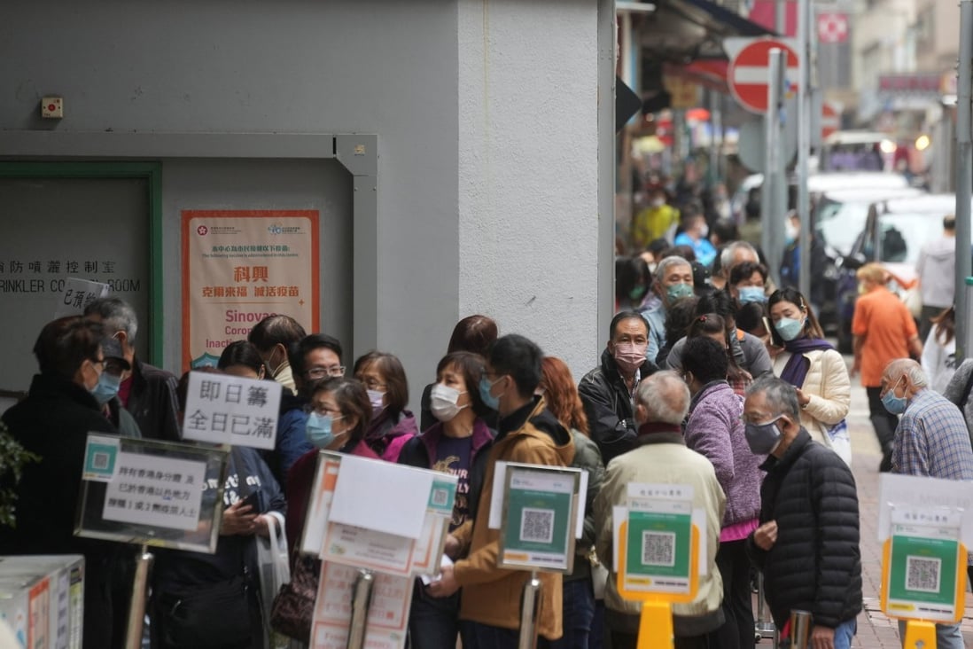 People waiting outside a community vaccination centre in Hong Kong last week. Photo: Reuters