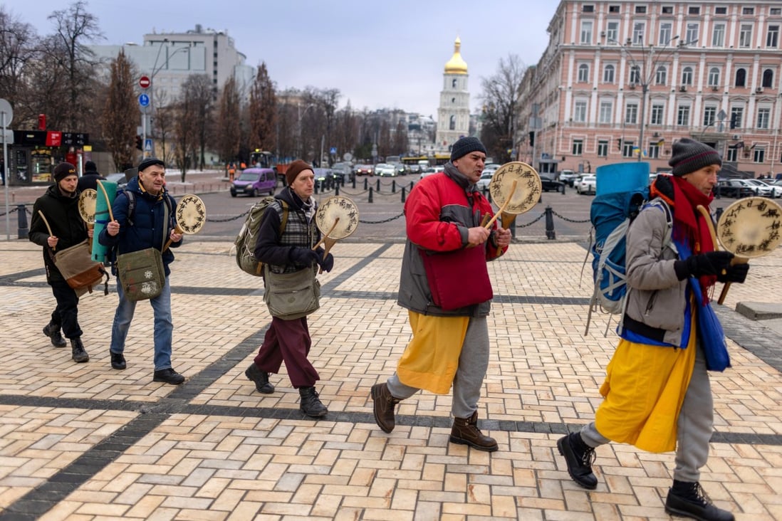 Buddhist monks and followers pray for peace in Kyiv, Ukraine, on February 16. Tensions over a possible invasion by Russia have accentuated long-standing weaknesses in the Western alliance. Photo: Bloomberg