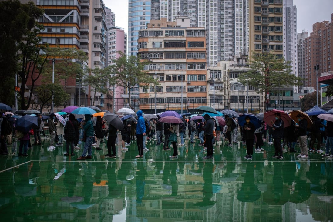 Residents queue at a Covid-19 testing facility in Hong Kong on February 17, amid the city’s worst wave of infection. Photo: Bloomberg