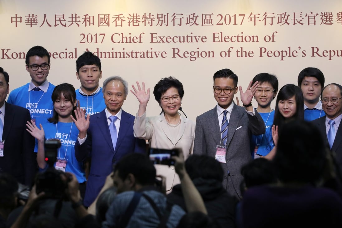 Carrie Lam, husband Lam Siu-por (left) and son Jeremy Lam Tsit-sze (right) meet the media after she won the chief executive race in March 2017. Photo: Sam Tsang