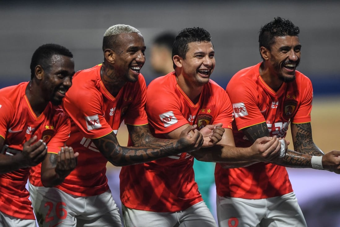 (From left) Fernando Fei Nanduo, Anderson Talisca, Elkesen Ai Kesen, and Paulinho in a game for Guangzhou Evergrande Taobao against Shanghai Greenland Shenhua in the postponed Chinese Football Association Super League (CSL) season in the Dalian Division in 2020. Photo: Xinhua   