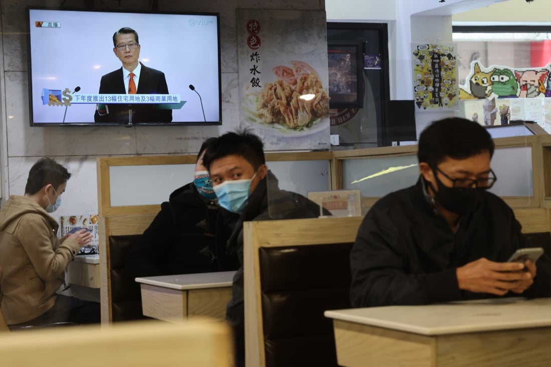 Financial Secretary Paul Chan’s budget speech is shown in a restaurant in Wan Chai on February 23. Photo: May Tse