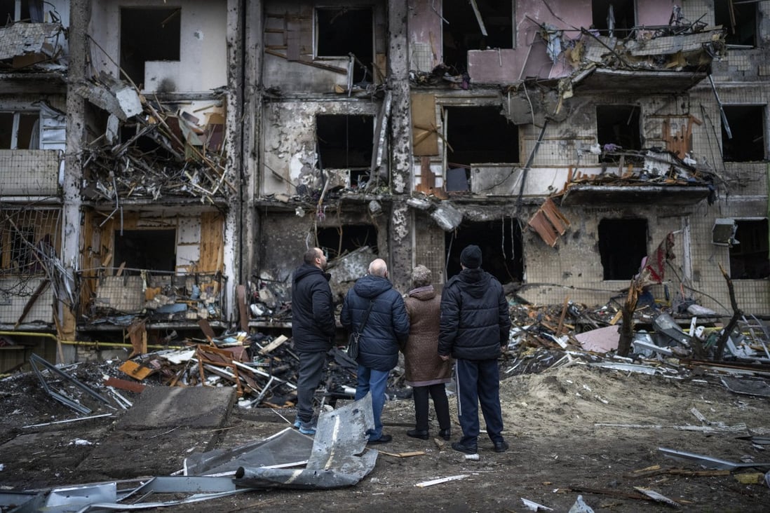 People look at the damage following a rocket attack in the city of Kyiv, Ukraine. Photo: AP