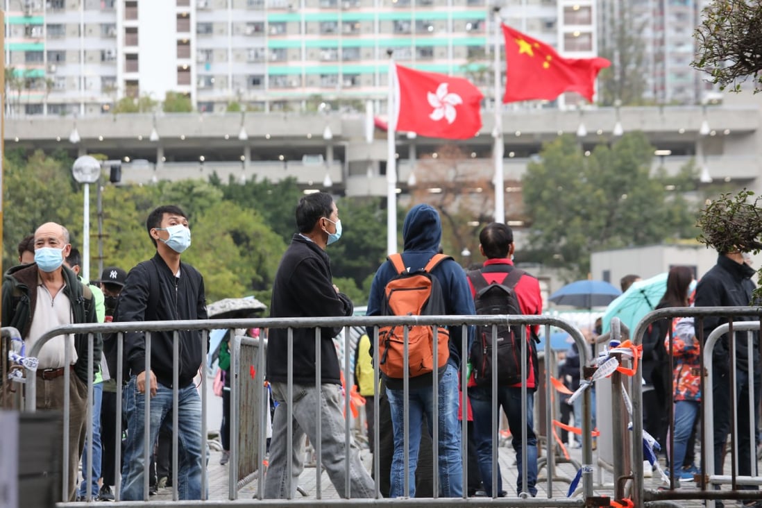 Residents queue up for Covid-19 testing at a mobile specimen collection station in Hong Kong. Photo: Jelly Tse