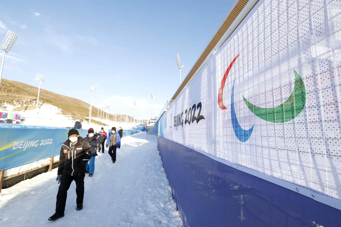 The Paralympic symbol featuring the red, blue and green Agitos  (Latin for “I move”) is visible at the competition venue for biathlon and cross-country skiing in Zhangjiakou, China, ahead of the March 4 opening of the Beijing Winter Paralympics. Photo: Kyodo