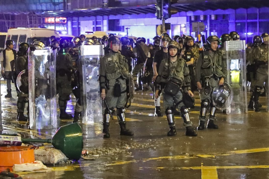 Hong Kong police clear the streets in Sham Shui Po after facing off with protesters on August 25, 2019. Photo: Edmond So
