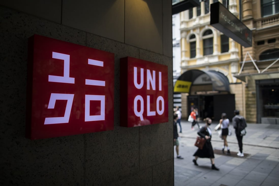 A Uniqlo sign is seen outside a store in Sydney, Australia in February. Photo: Bloomberg