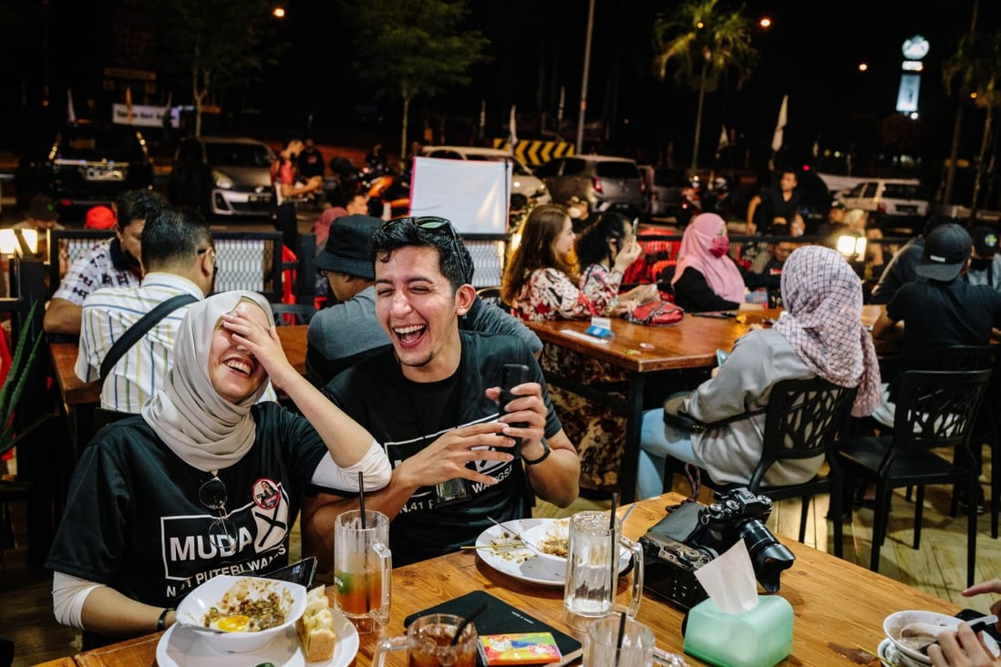 Young volunteers working on the campaign for Amira Aisya Abd Aziz, secretary-general of Malaysian United Democratic Alliance (MUDA). Photo: Bloomberg