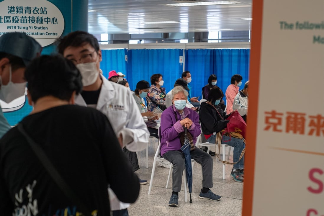 People rest after receiving the coronavirus vaccine at a centre set up at Tsing Yi MTR station, on March 11. The government’s failure to push vaccinations among the elderly has been blamed for the high number of deaths during Hong Kong’s fifth Covid-19 outbreak. Photo: EPA-EFE