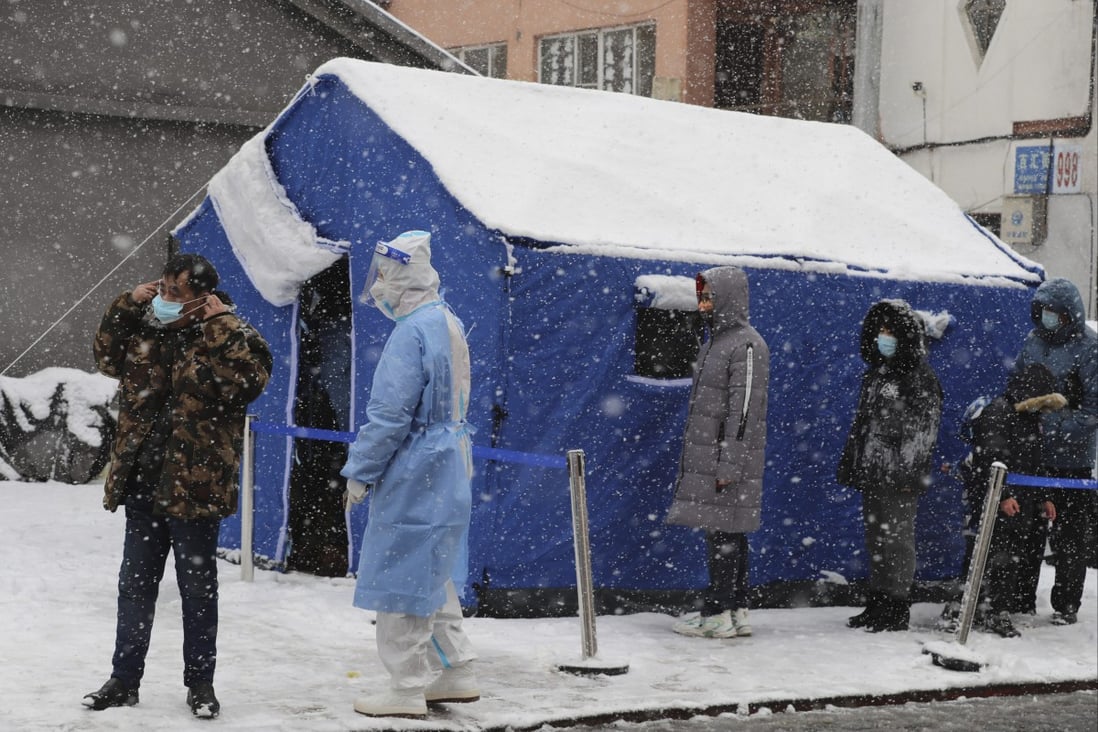 Residents queue in the snow for Covid-19 tests in Changchun, Jilin province, on Tuesday. Photo: AP