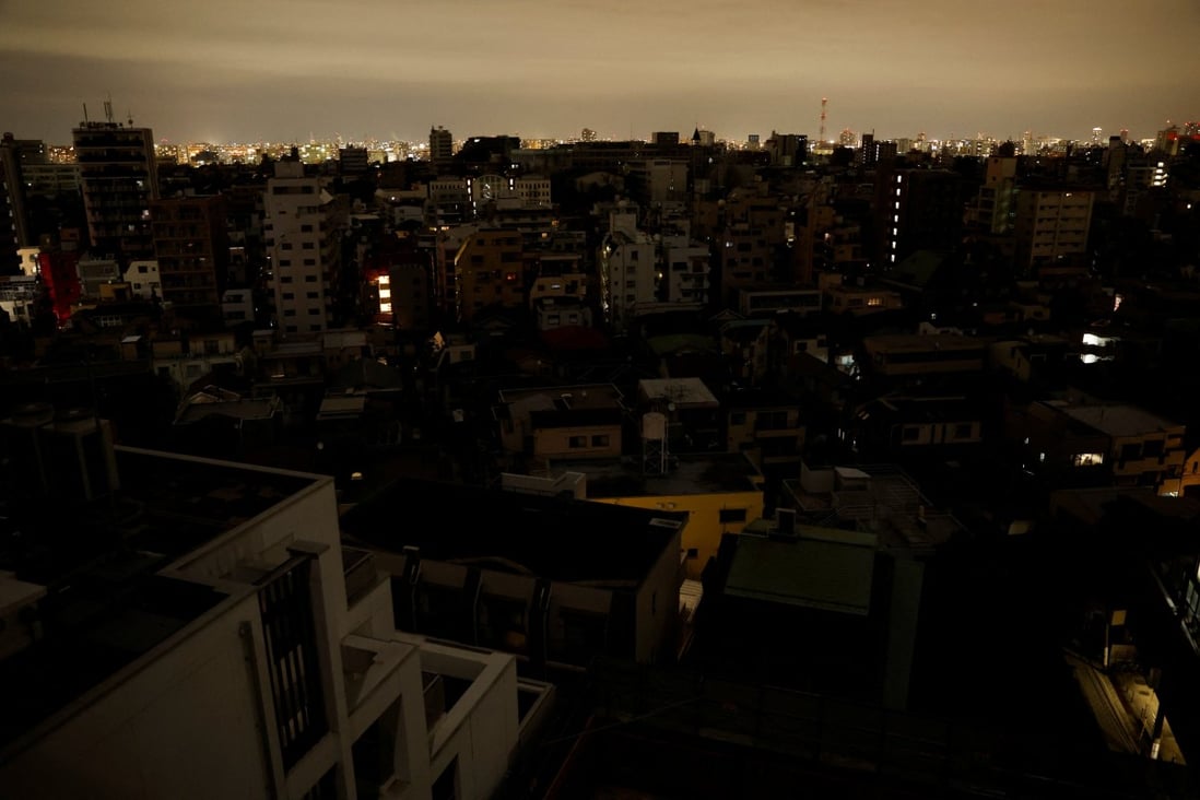 Houses and buildings are seen after a blackout hit Toshima ward in Tokyo following Wednesday’s earthquake. Photo: Reuters