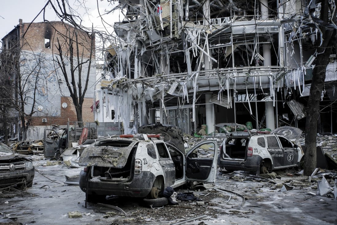 Damaged vehicles and buildings in Kharkiv city center in Ukraine on March 16. Photo: AP Photo