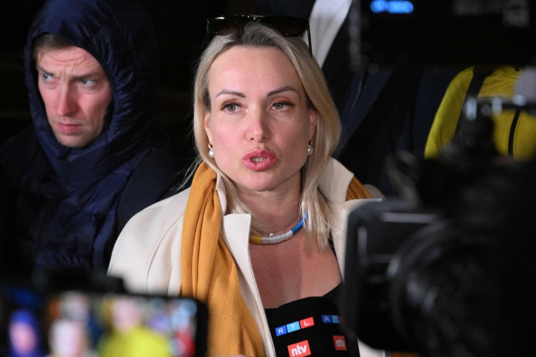 Marina Ovsyannikova, the journalist who protested against Russian military action in Ukraine during a live news broadcast, speaks to the media as she leaves the Ostankinsky District Court on Tuesday. Photo: AFP