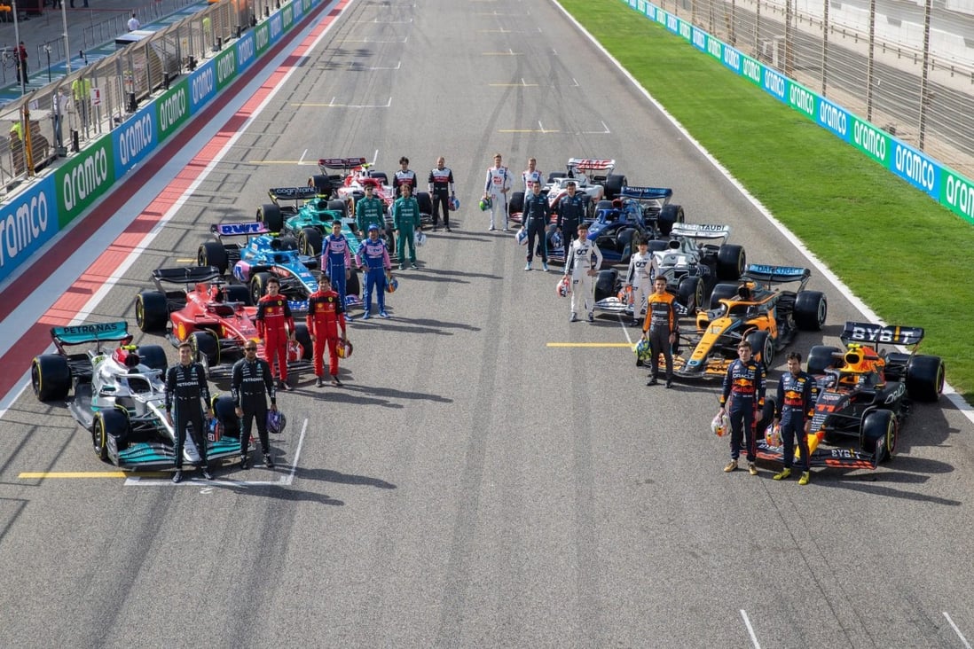 This season’s drivers pose on the grid during day one of testing in Bahrain. Photo: Formula One
