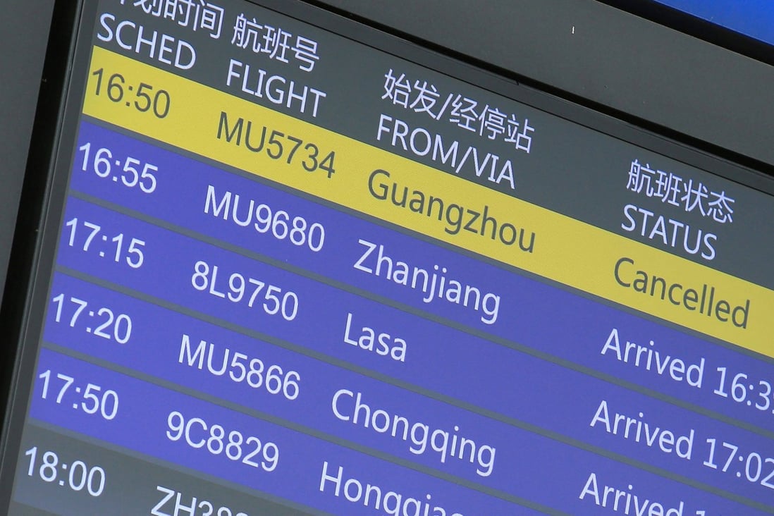 A flight information board shows a cancelled China Eastern Airlines flight at the Kunming Changshui International Airport on Monday. Photo: AFP