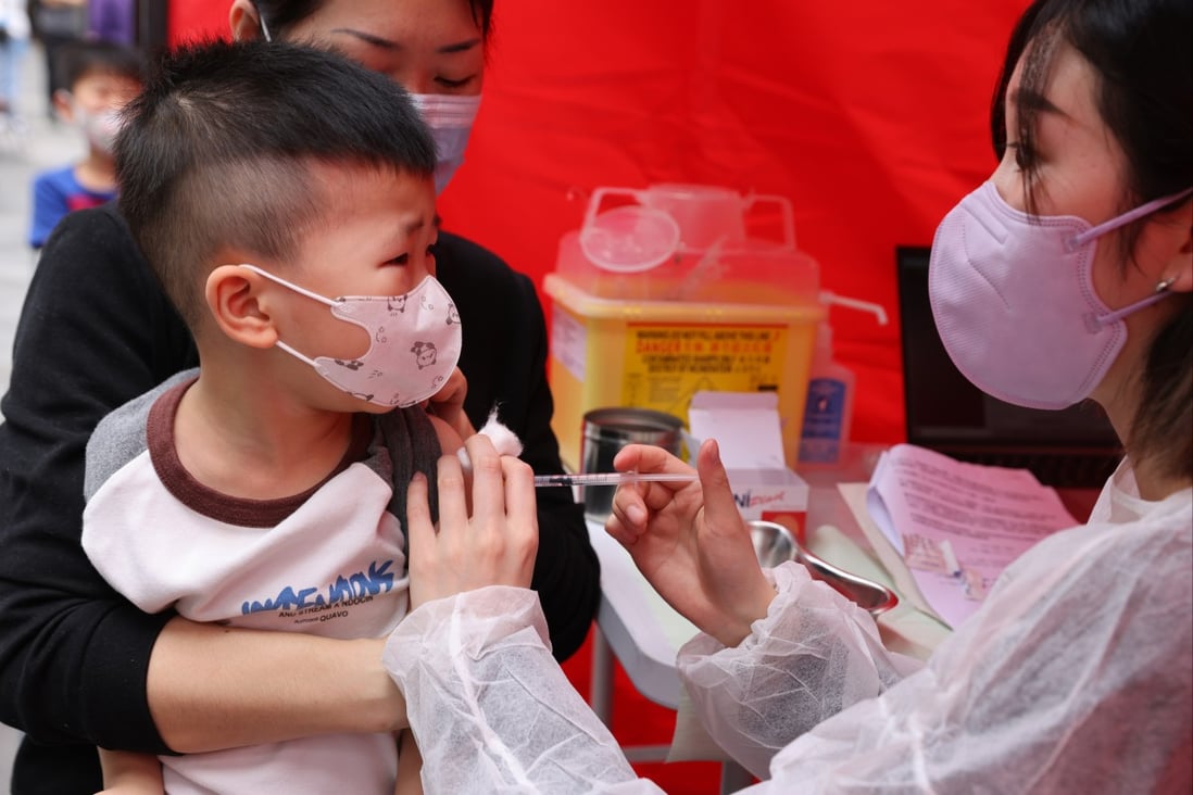 Children receive free Covid-19 jabs during a vaccination event at Hoi Ying Estate in Cheung Sha Wan on March 22. Photo: Nora Tam