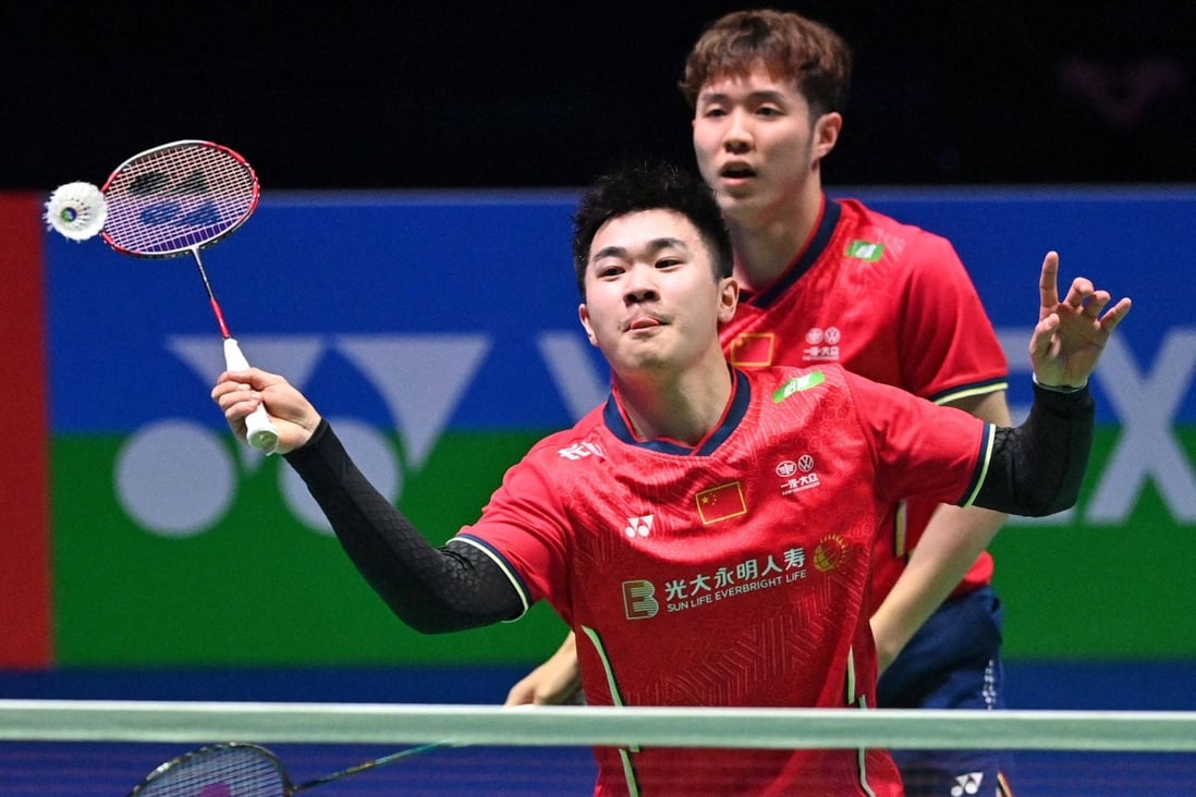 Tan Qiang (left) and He Jiting of the Chinese team in a men’s doubles semi-final game against Mohammad Ahsan and Hendra Setiawan of Indonesia at the All England Open Badminton Championship event in Birmingham. Photo: AFP   