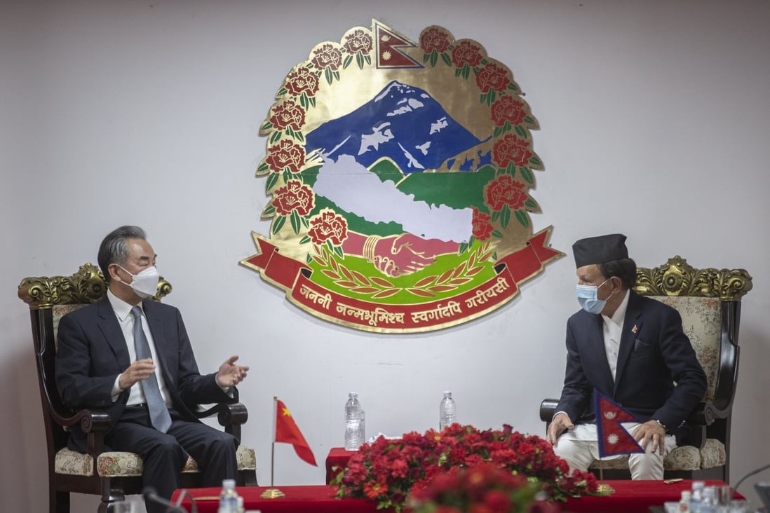 Nepali Foreign Minister Narayan Khadka (right) and Chinese Foreign Minister Wang Yi hold talks in Kathmandu on Saturday. Photo: EPA-EFE