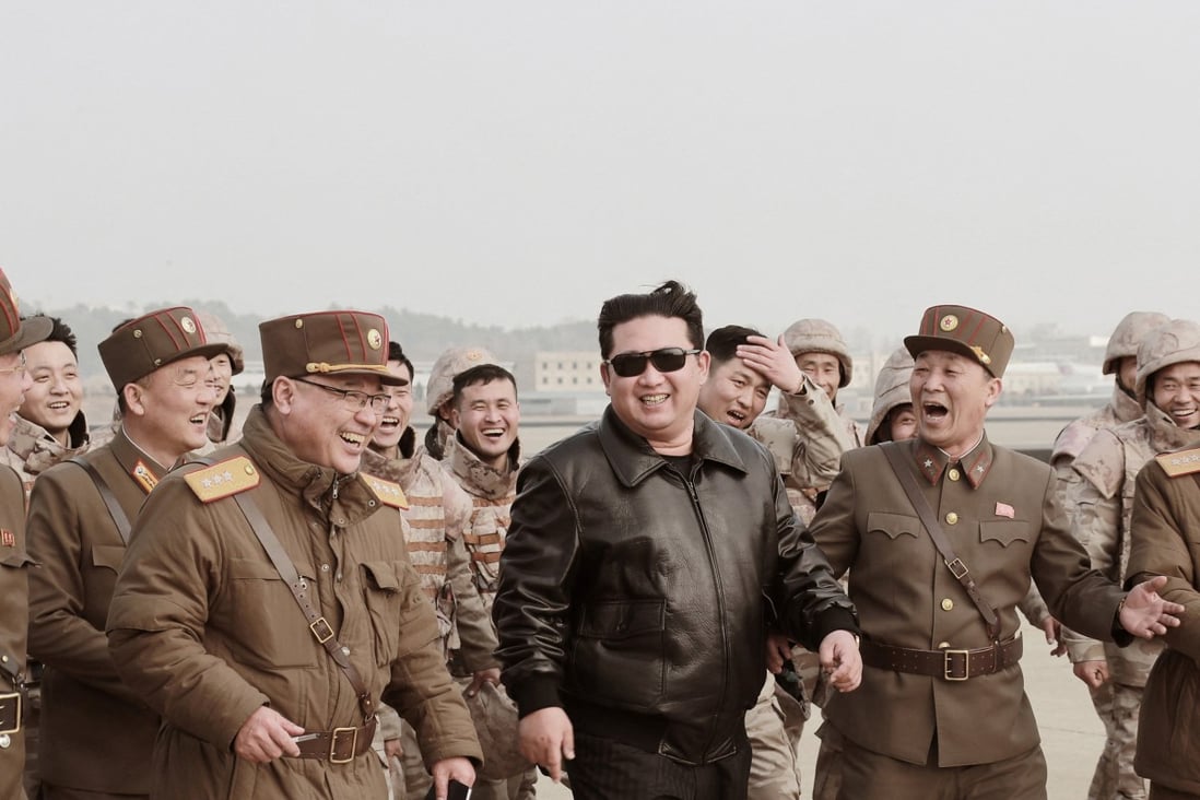 North Korean leader Kim Jong-un with military officials during the launch of the Hwasong-17 ICBM on March 24. Photo: KCNA via Reuters