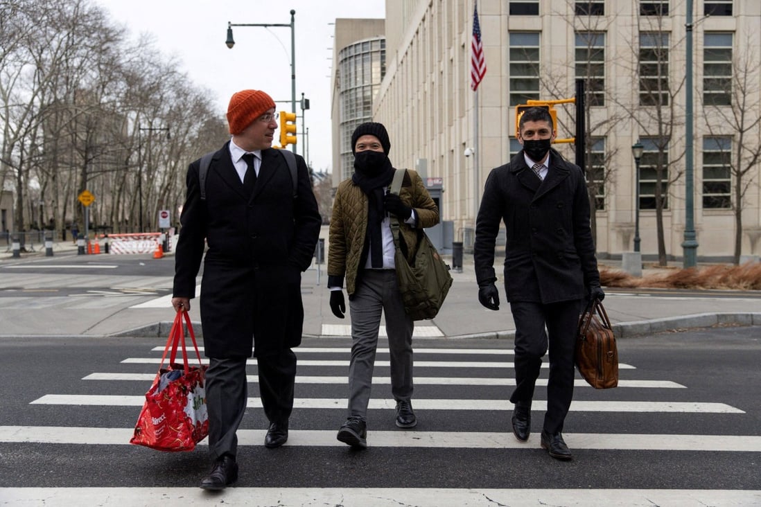 Ex-Goldman banker Roger Ng (centre) leaves the courthouse in Brooklyn, New York. File photo: Reuters