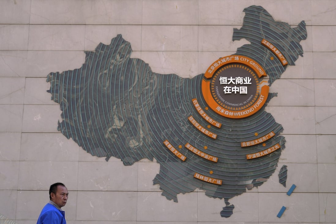A map showing China Evergrande Group’s development projects in China on a wall at the Evergrande City plaza in Beijing on September 21, 2021. Photo: AP