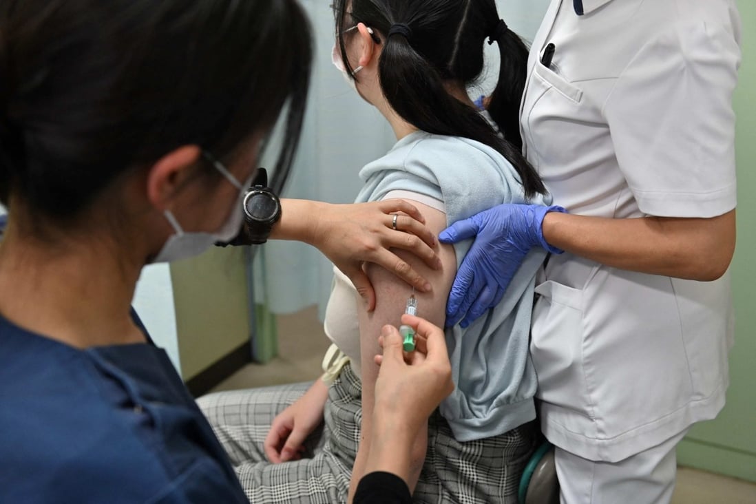 A 13-year-old student receives the HPV vaccine at a hospital in Tokyo. Photo: AFP