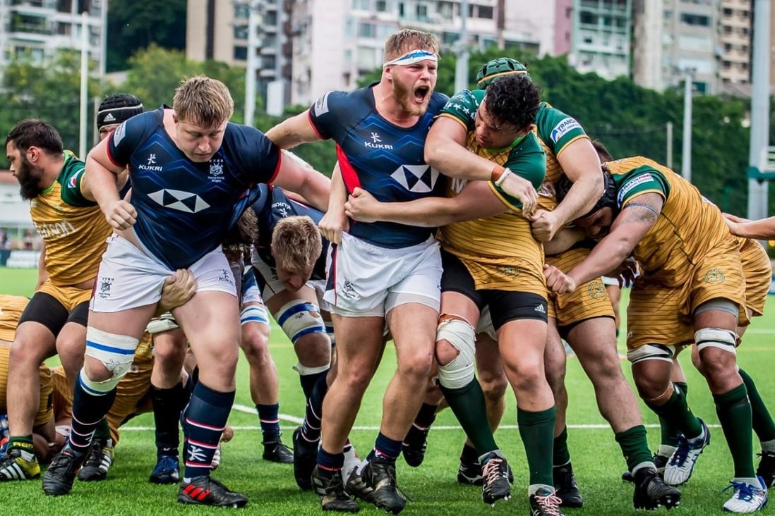 Hong Kong men’s rugby union representative team player Alexander Post (centre) in a game against Cook Islands at Happy Valley in 2019. Photo: HKRU   
