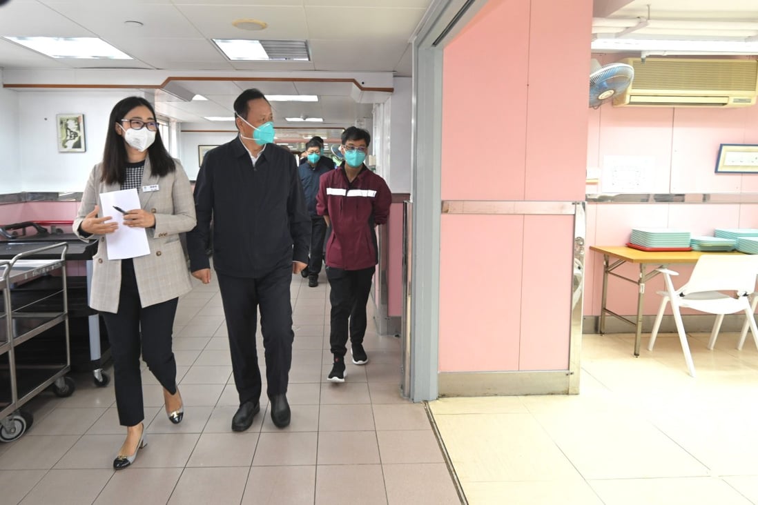 Tong Xiaolin (centre) and his team visited two residential care homes for the elderly. Photo: SCMP