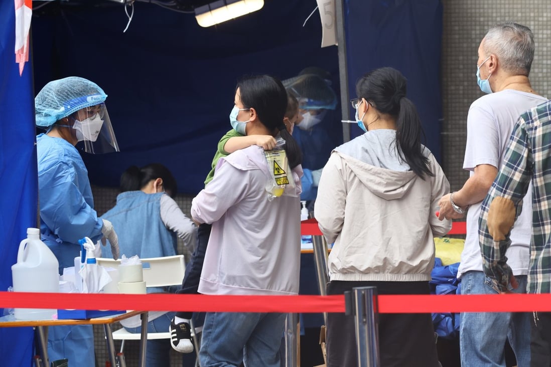 Residents undergo mandatory testing at a housing estate under lockdown in Hong Kong. Photo: Dickson Lee