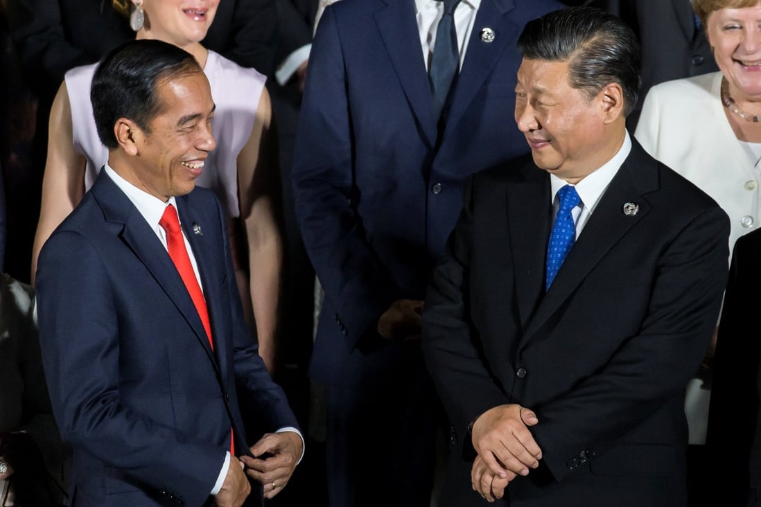 Indonesia’s President Joko Widodo speaks with China’s President Xi Jinping at the G20 summit in 2019. Photo: Reuters