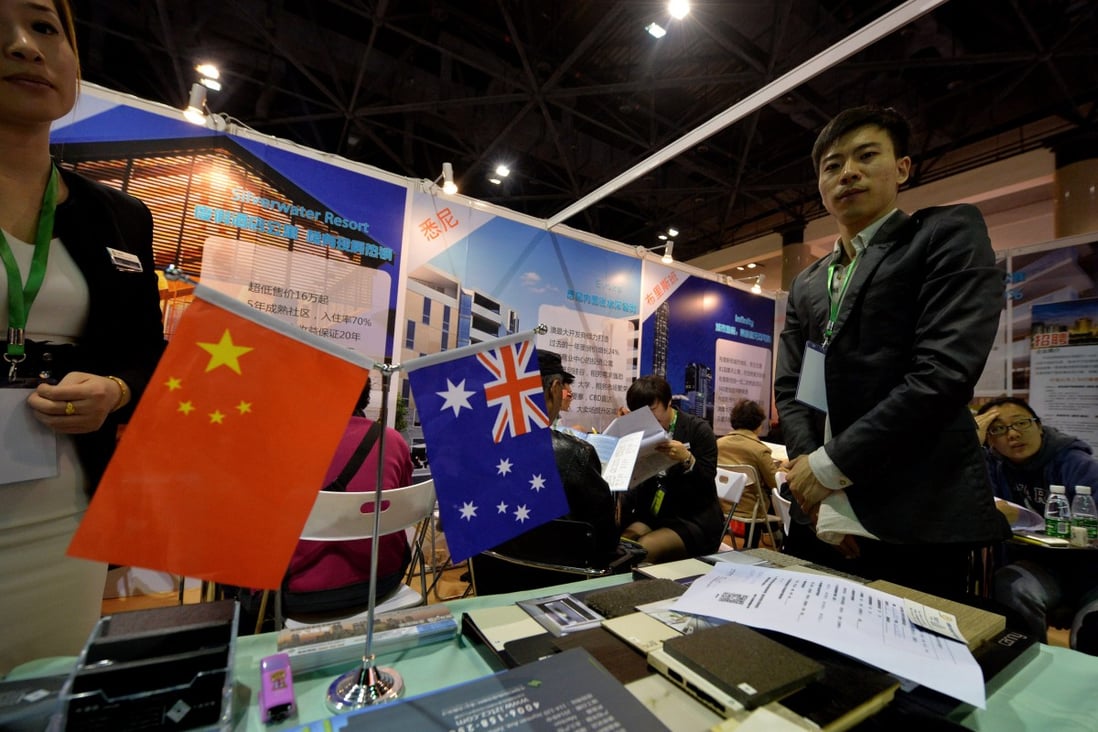 Wealthy Chinese people have been keen to put money into Australia, with many attending property investment sessions in China. File photo: AFP