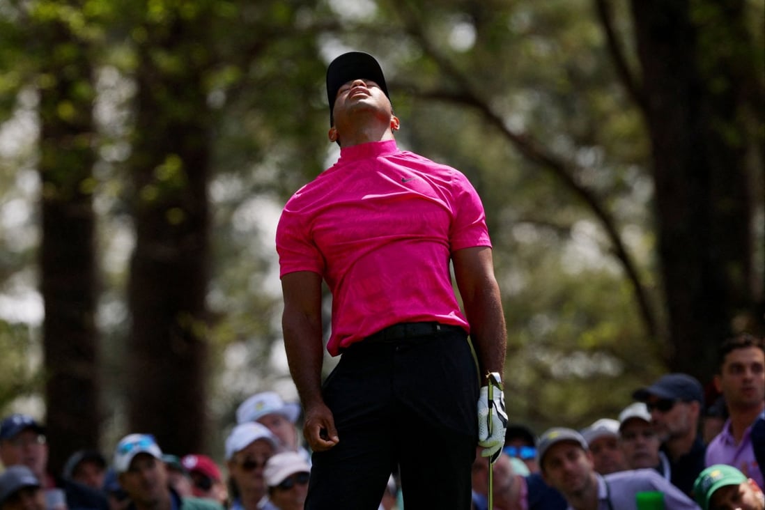 Tiger Woods reacts after his tee shot on the 4th during the first round of the Masters. Photo: Reuters
