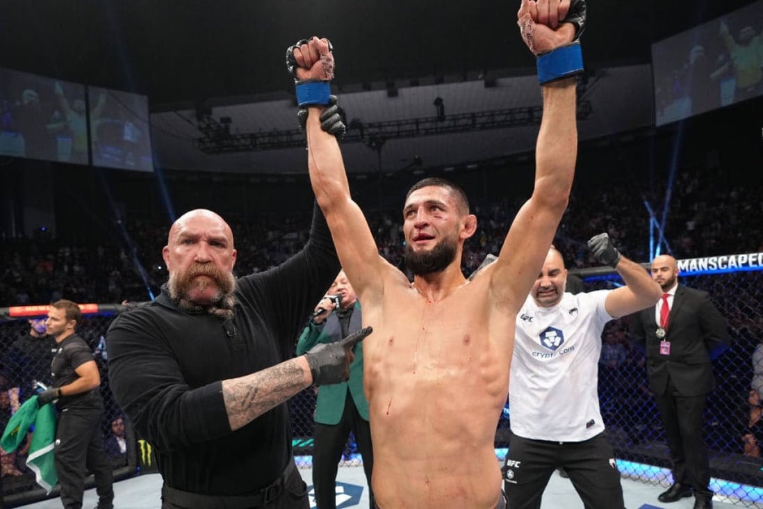 Khamzat Chimaev reacts after his decision victory over Gilbert Burns in their welterweight fight at UFC 273. Photo: Jeff Bottari/Zuffa LLC