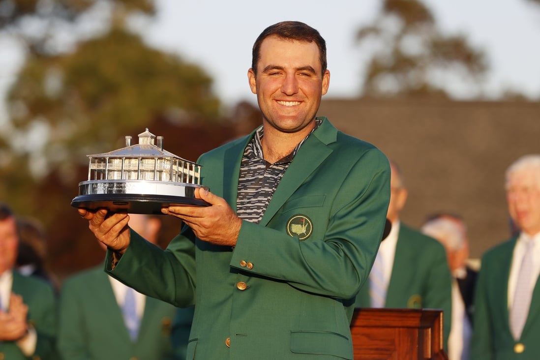 Scottie Scheffler holds the Masters trophy during the green jacket ceremony after winning the 2022 Masters Tournament. Photo: EPA-EFE