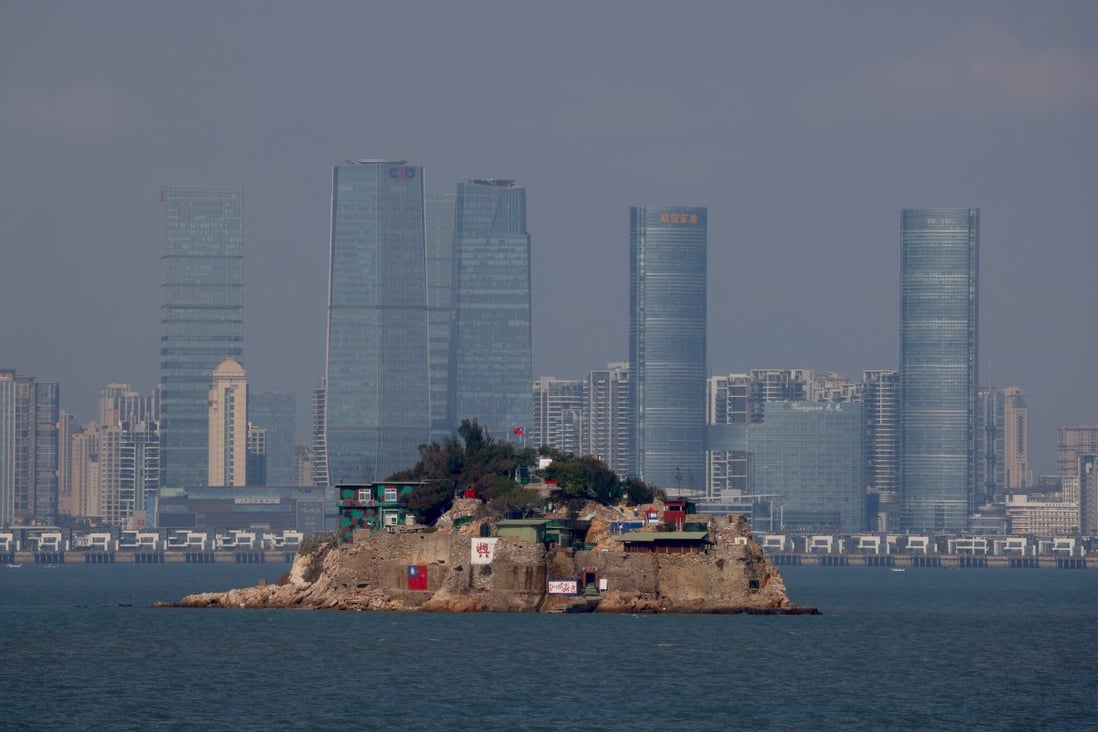 The flag of Taiwan is seen painted on Shihyu Islet in front of Xiamen, Fujian province, on October 19, 2021. Sitting on the front line between Taiwan and China, Kinmen is the last place where the two engaged in major fighting, in 1958 at the height of the Cold War, and where memories of war are burned into minds decades later. Photo: Reuters