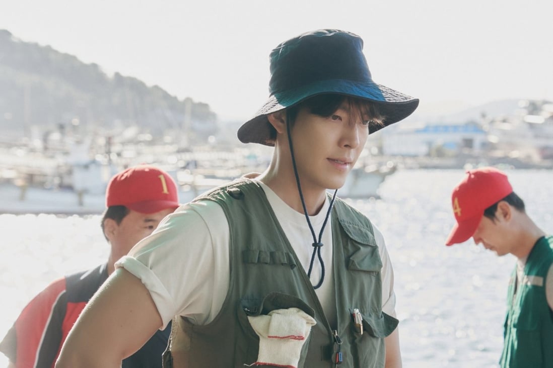 Kim Woo-bin in a still from Netflix K-drama Our Blues, set on South Korea’s famous Jeju Island.