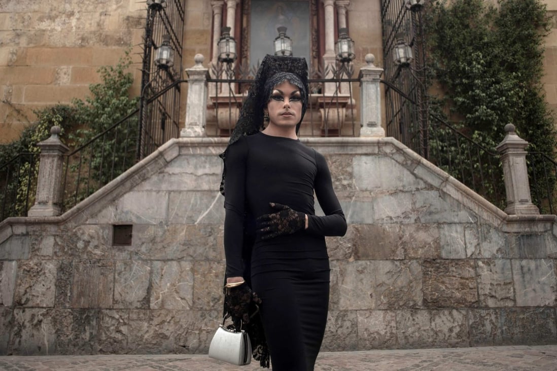 Dancer and drag queen Carlos Carvento celebrates Holy Week in Spain by dressing in mourning and wearing a traditional “mantilla”. Photo: AFP