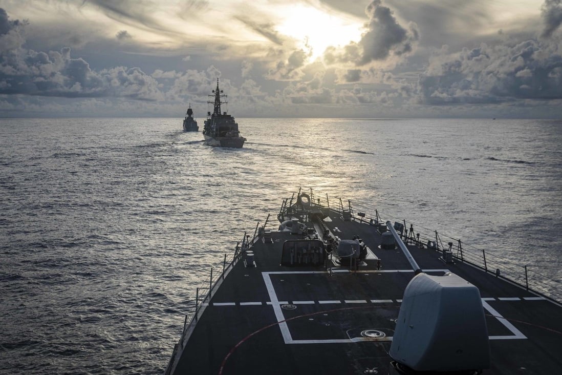 USS John S. McCain, the Royal Australian Navy’s HMAS Arunta and Japan Maritime Self-Defence Force’s JS Kirisame operate together during a trilateral exercise in the South China Sea on October 22, 2020. Photo: US Pacific Fleet