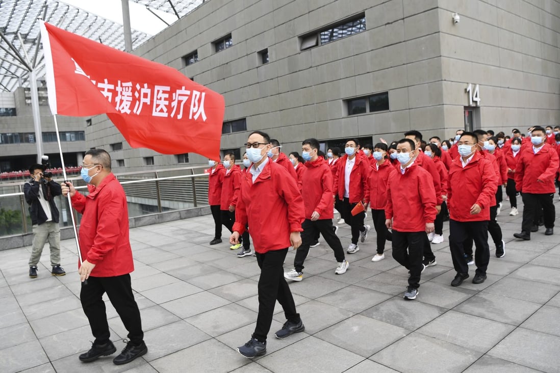 Medics from Chongqing depart for   Shanghai to aid the Covid-19 battle there. Photo: Xinhua