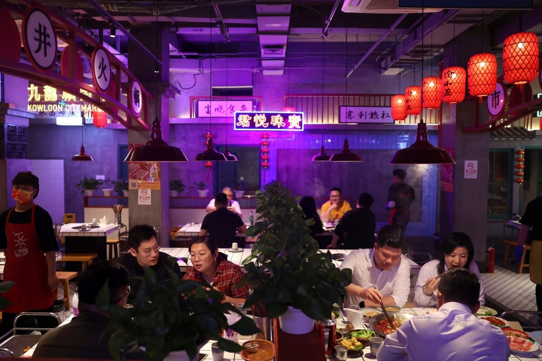People dine at a hotpot restaurant in Beijing on April 8. Chinese policymakers must convince consumers to go out and spend money if they hope to sustain economic growth at a time of increasing global headwinds. Photo: Reuters
