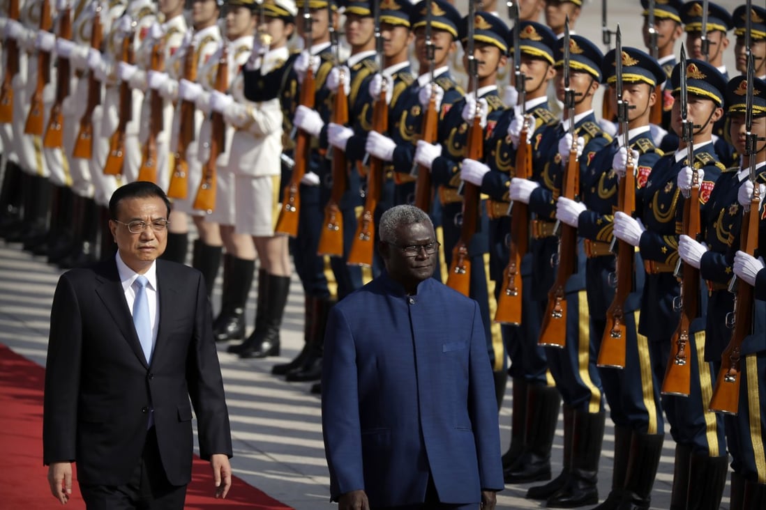 Chinese Premier Li Keqiang, left, and Solomon Islands Prime Minister Manasseh Sogavare are pictured in 2019. The US announced on Monday it was sending two top officials to the Solomons  over concerns  China could establish a military presence in the  island nation. Photo: AP Photo