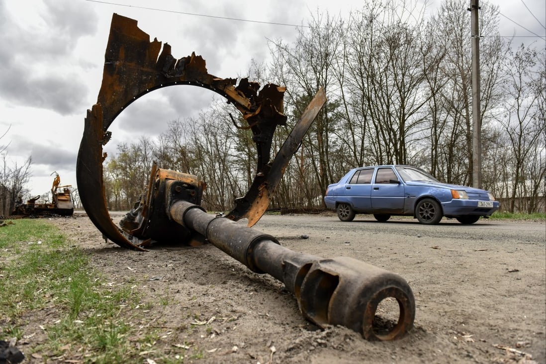 Parts of a destroyed self-propelled artillery system lie on the road near the town of Borodyanka, near Kyiv, in the Ukraine on Monday. Photo: EPA-EFE
