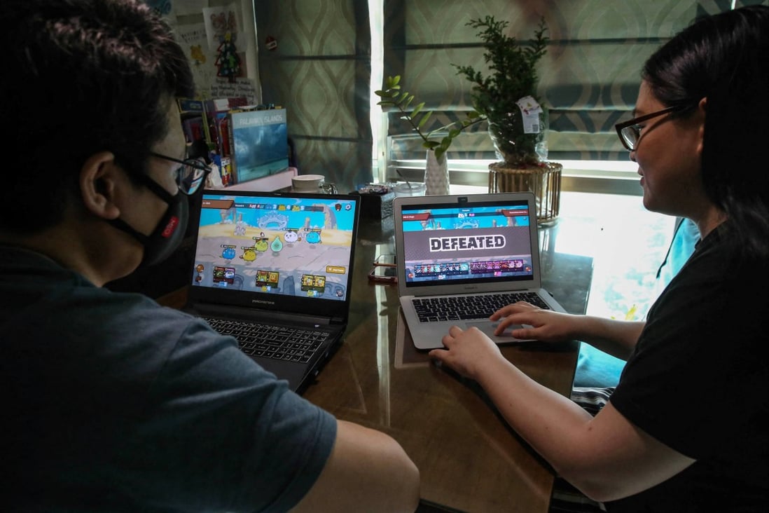 Video gaming is moving centre stage for NFT market as cartoon avatars fade. Photo: AFP  