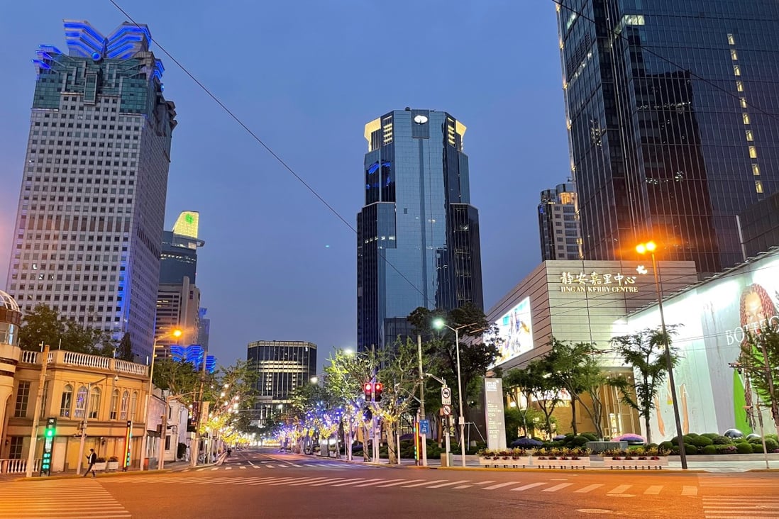 Ornamental lights decorate an empty street during lockdown in Shanghai on April 20. The Chinese government’s insistence on a “zero-tolerance” approach to Covid-19 is weighing on the economy as well as global sentiment. Photo: Reuters